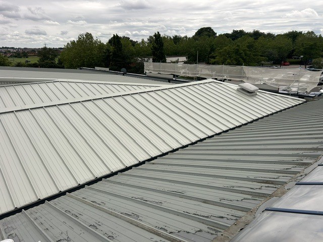Close-up of the failing gutter network allowing water ingress